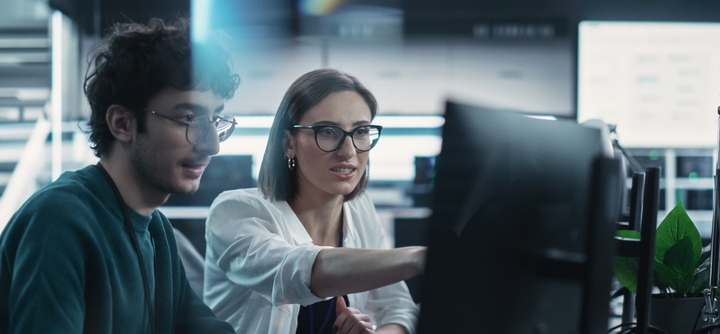 Software developers collaborating